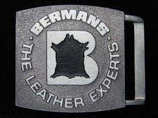 QF11114 NOS VINTAGE 1970s BERMANS THE LEATHER EXPERTS ADVERTISEMENT BUCKLE