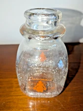Vintage Half Pint Square Dairimaid Milk Bottle Red Dutch Girl on both sides.