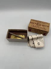 HERTER'S No. 99 Squirrel Call complete in the box w/ striker and Instructions