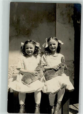 39898427 - Twins Girl with Rabbit on Lap Rabbit 1910