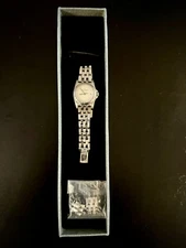 Ladies Universal Geneve Watch: Water Resistant, Sapphire Crystal