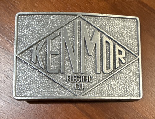 vintage belt buckle branding "KENMOR ELECTRIC CO