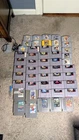 Lot of 50 Vintage NES/SNES/N64 game collection + new batteries and toolkit