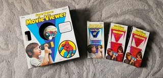 Super Heroes Movie Viewer By Mettoy Original Box And Cassette. 3 More Cassettes