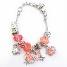 Stainless Steel Charm Bracelet With Pink Butt...