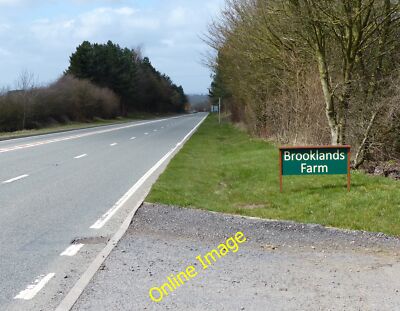 Photo 6x4 Entrance to Brooklands Farm Billesdon Looking west along the A4 c2013