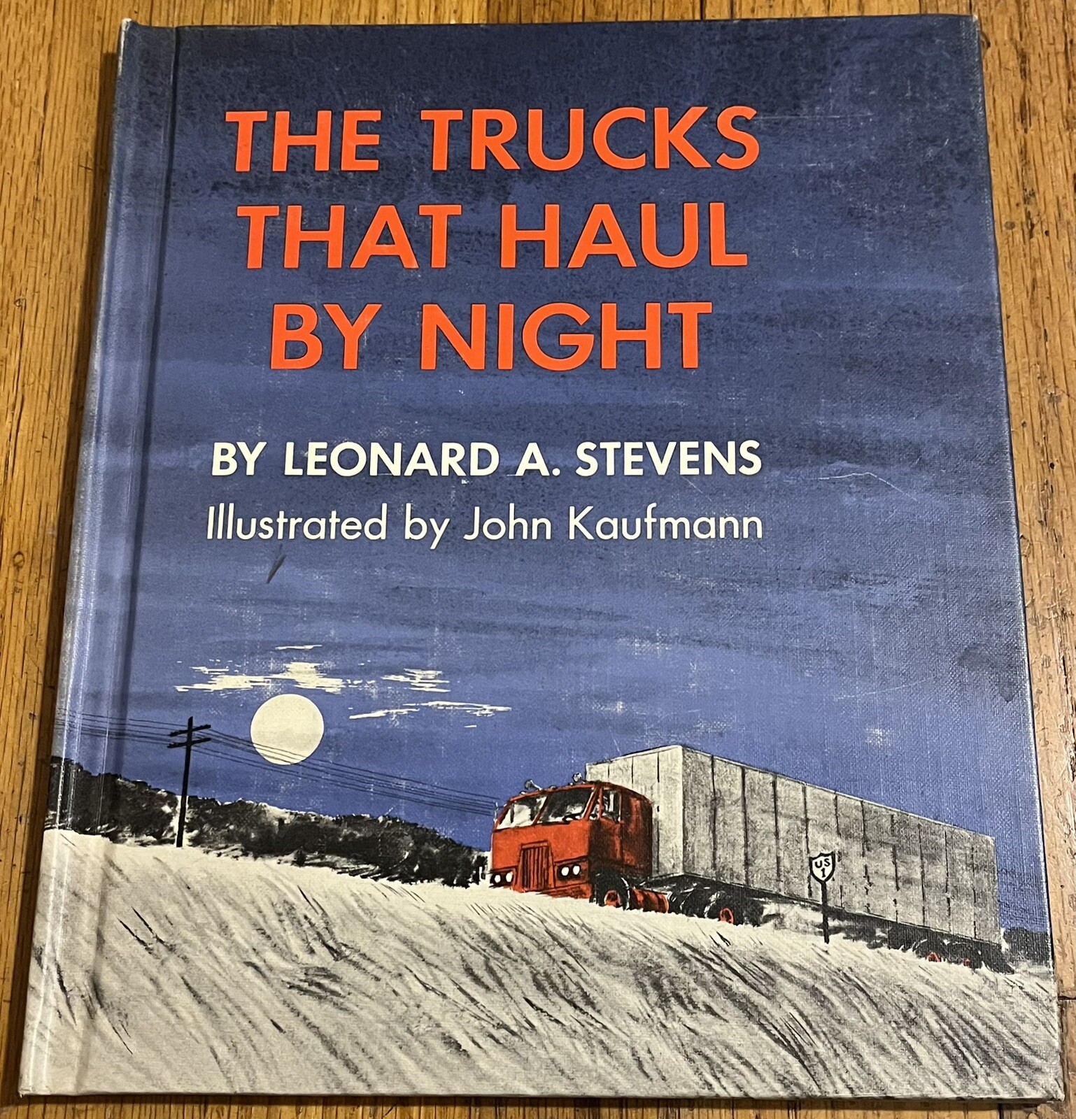 THE TRUCKS THAT HAUL BY NIGHT : Leonard Stevens : illus John Kaufmann : vintage