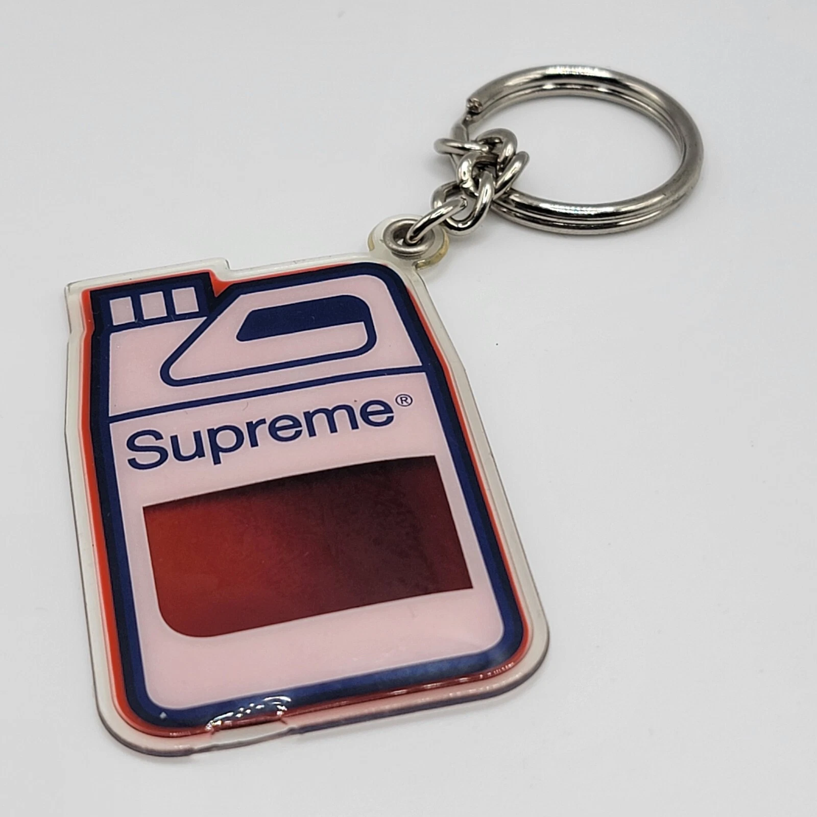Porte clés Supreme Jug Rouge FW19 NEUF véritable fluide intérieur