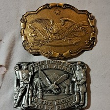 3 belt buckles. The right to bare arms.