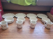 Longaberger "Traditonal Holly" 12 Piece Dinnerware Set