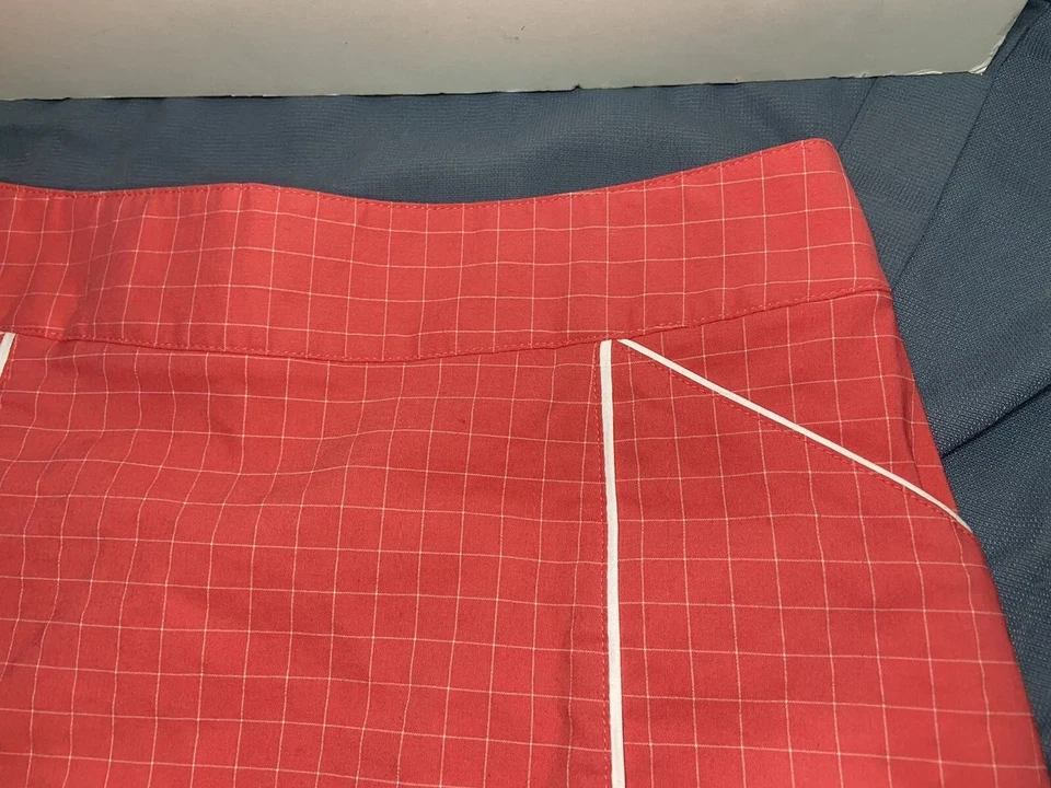 Falda corta LIja para mujer talla 10 naranja geométrica bolsillos cremallera ropa deportiva a presión Foto 3 de 4