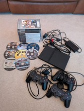 PS2 Slim Bundle - 3 Controllers,  2 Memory Cards , 11 Boxed Games, 7 Loose Discs