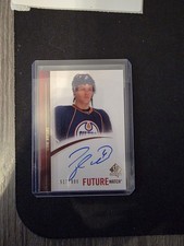 Taylor Hall Future Watch Auto / 999 2011 SP Authentic Rookie Card Hurricanes . rookie card picture