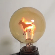 Vintage Aerolux Light Bulb Double Horses Figural Filament