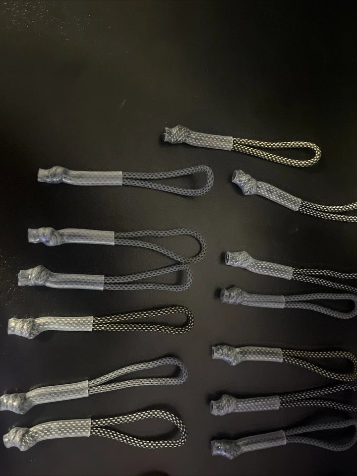 Nike Backpack Zipper Strings.13 Grey, 7 Black, 2 Blues, And 1 Red. 23 Total. - Image 3 of 4