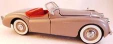 The Danbury Mint 1949 Silver Grey Jaguar XK-120 with Title Scale 1:24