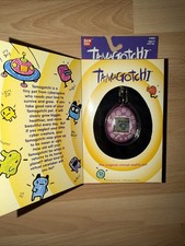 Brand New Factory Sealed Bandai Tamagotchi 1997 1800 Pink  Purple w/ Swirls