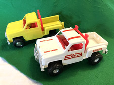 Vintage Chevy Truck Pair Processed Plastics Company