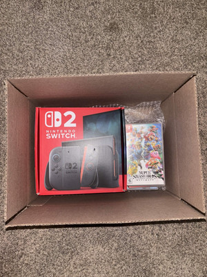 Nintendo Switch 2 Bundle. Open Box, Slightly Used Condition. Includes 7 Games.