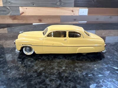 1:43 EMPIRE ZAUGG MODEL TIN WIZARD 6 MERCURY 51 1951 YELLOW