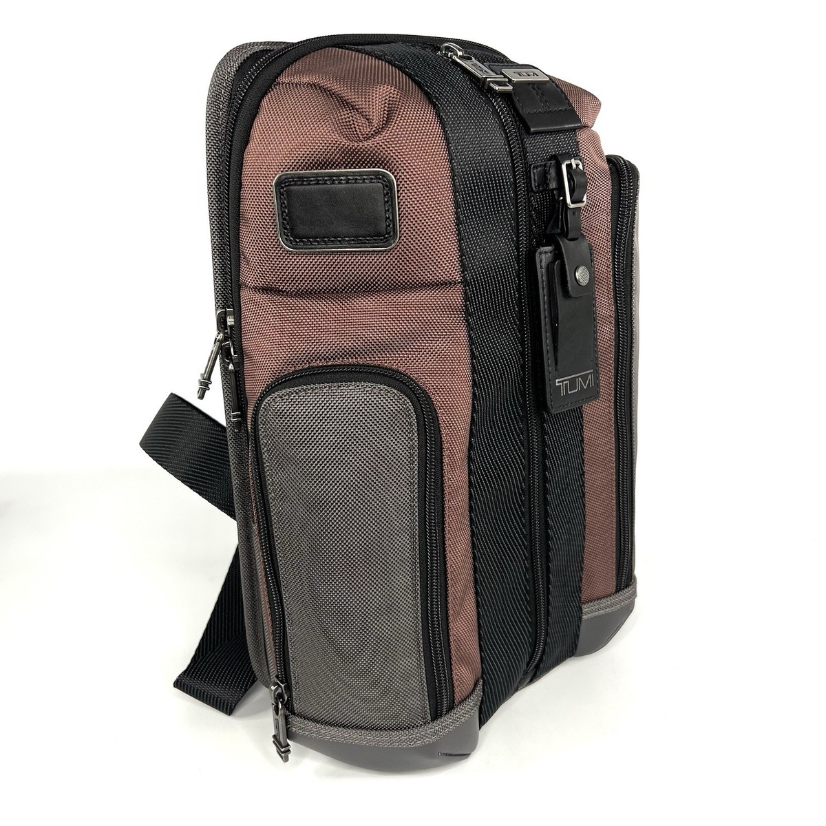 TUMI Higgins Sling Crossbody Day Bag Copper Gray and Black