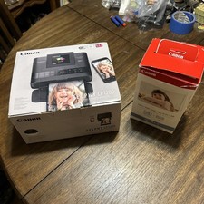 Canon Selphy CP1200 Portable Compact Photo Center with Ink and Paper Set