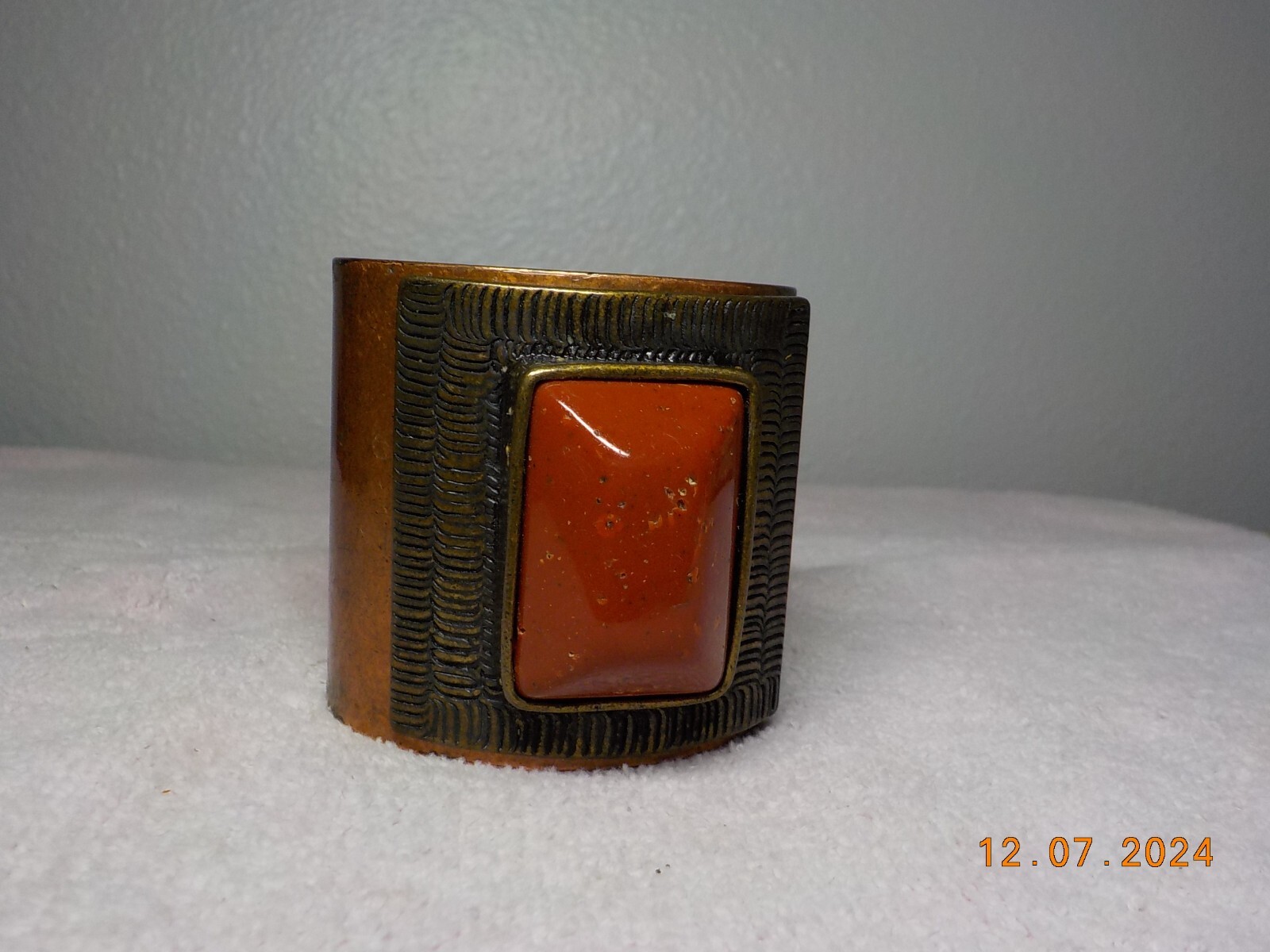 COPPER COLORED CUFF WITH APPLIED LAYER WITH BEZEL… - image 1