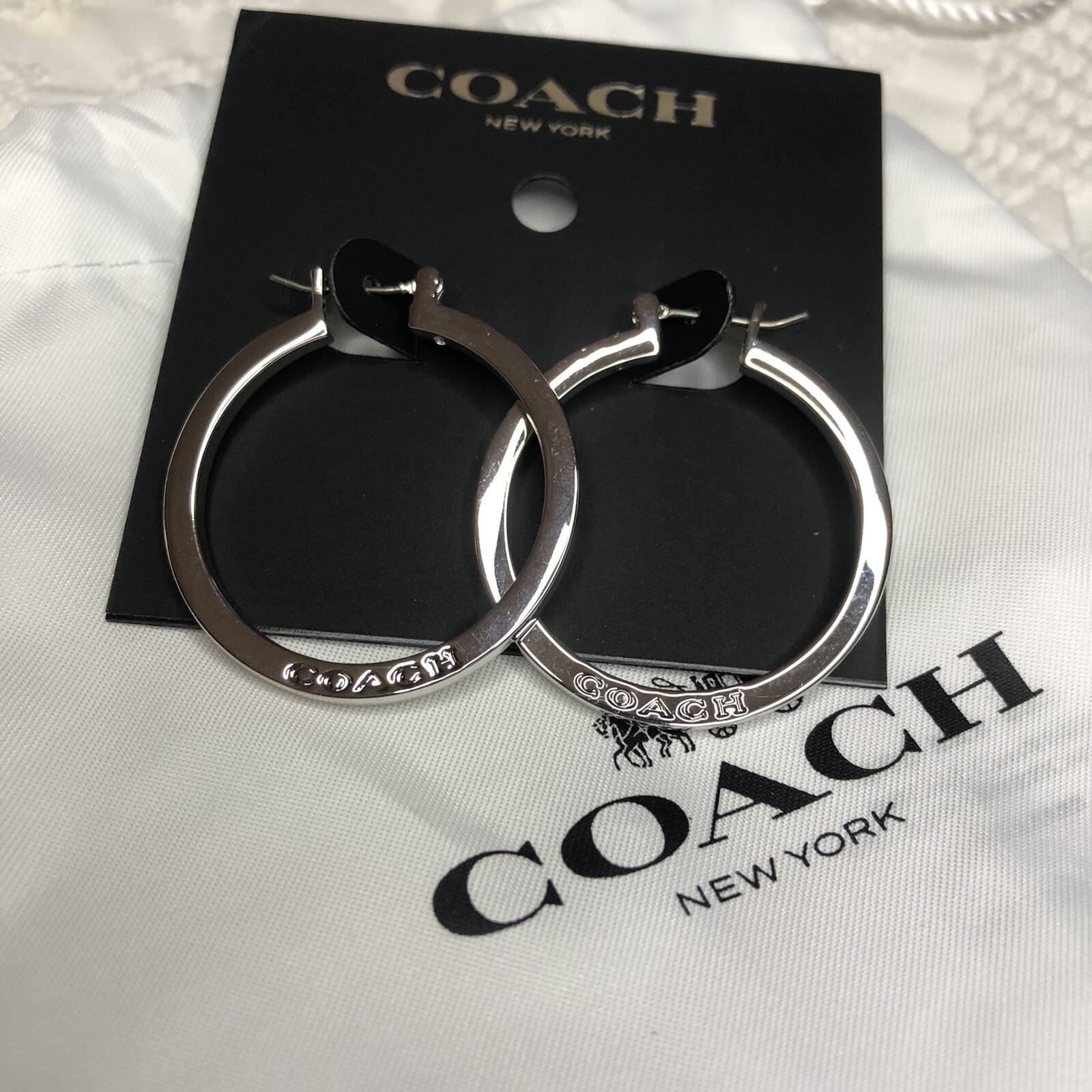silver coach hoop earrings