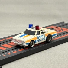 AFX Chevy State Police SP-3 Chevrolet Police Car HO Slot Car Aurora In stock
