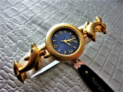 Montre Dame SW à Motifs Dauphins - Cadran Blanc, Bracelet Acier Argenté - Neuve De Stock, Jamais Portée