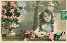 Vintage greetings French postcard early 20th century little girl with flowers