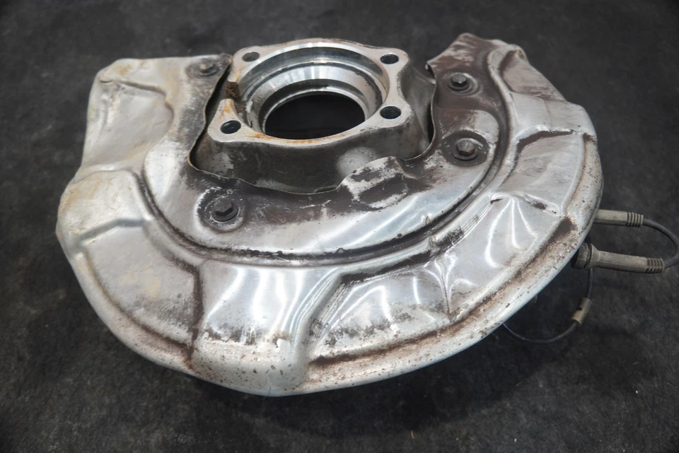 Suspensión trasera husillo izquierdo nudillo porta rueda 33306866335 BMW 540i 530i G30 Foto 2 de 4