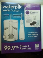 Waterpik Ultra Plus Water Flosser Cordless Travel Combo Pack new sealed