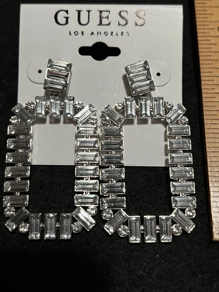 NEW GUESS SILVER TONE "O" SHAPED CRYSTALS BAGUTTE EARRINGS 2.3x1.3 MSRP $25 - Image 3 of 4