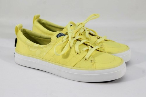 yellow sperry sneakers