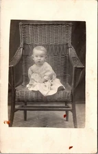 Postcard Infant in Dress Sitting on Wicker Chair Real Photo RPPC Unposted