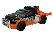 Hot Wheels Repo Duty Black Orange Tow Truck Repo G12 2014 Loose 164 Hot Wheels Repo Duty Black Orange Tow Truck Repo G12 2014 Loose 164