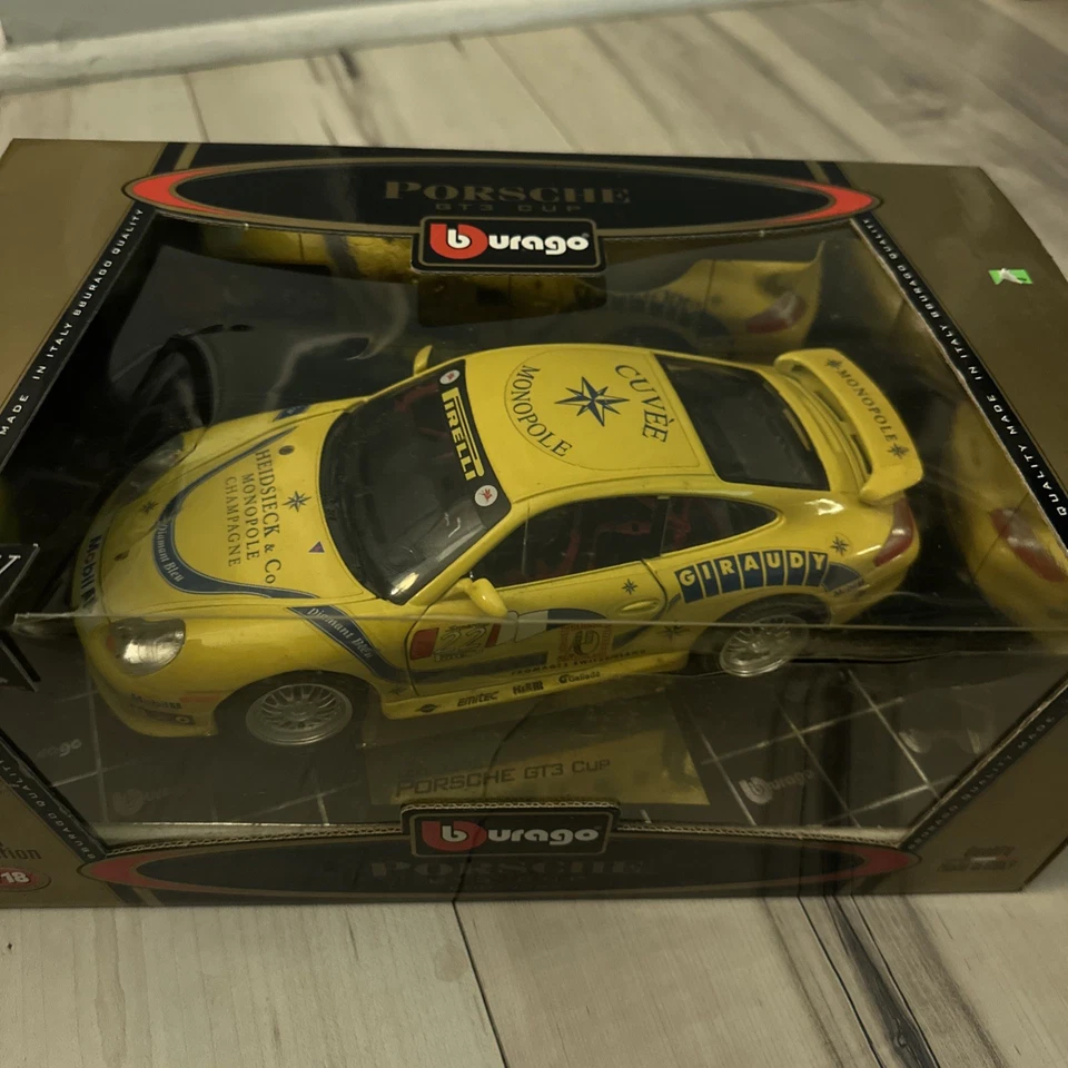 Burago Gold масштаб 1:18 литой Porsche GT3 Cup Cuvee Monopole Cod. 3395 желтый - Изображение 4 из 4