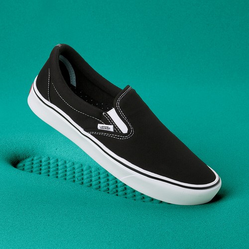 size 4 black slip on vans