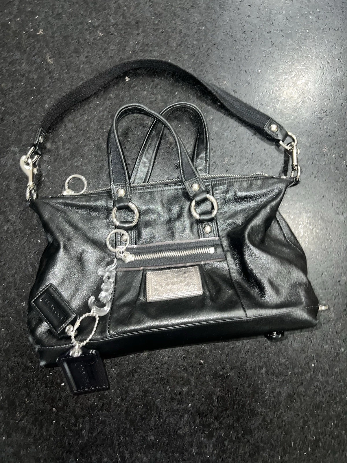 NUOVA BORSA COACH POPPY NERA PELLE SCINTILLANTE VIOLA INTERNO PORTACHIAVI