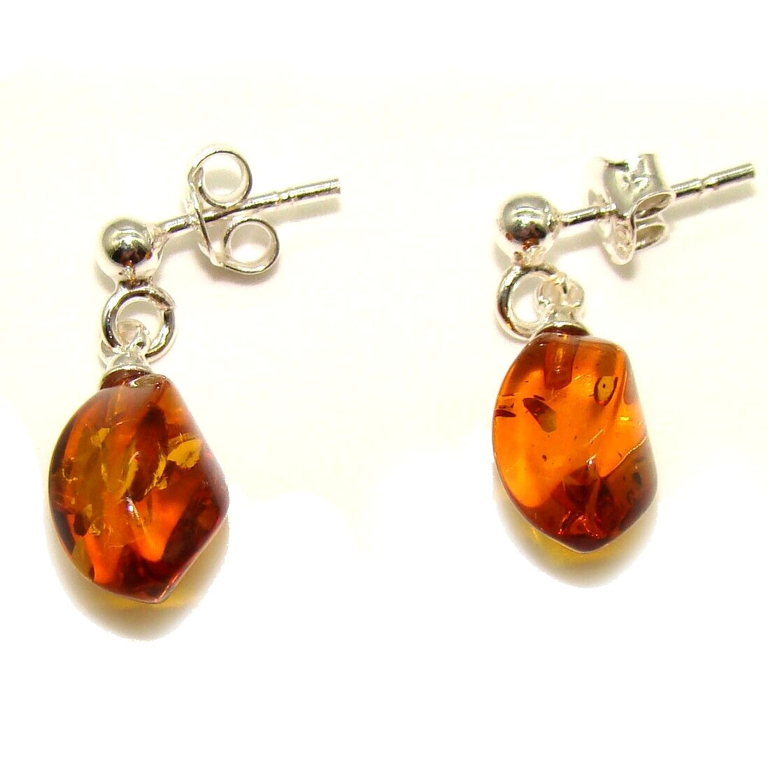 Boucles d'oreilles en ambre naturel de la Baltique facetté et argent 925 d'exception