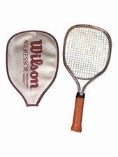 This is a vintage Wilson Aggressor racquetball racquet.