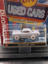 Auto World Thunderjet SC390 1964 Pontiac GTO iWheels HO Scale Slot Car Carded