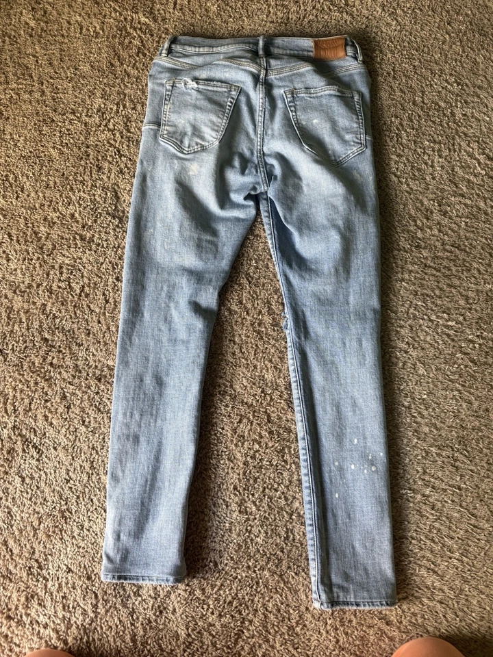 Pantalones de mezclilla ajustados Purple Brand P002 para hombre azules desgastados, talla 29, rodillas revenchadas Foto 4 de 4