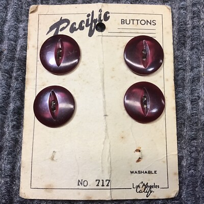 4 Vintage Pacific Buttons No. 717 ￼Burgundy iridescent Two Hole NOS W/ Wear