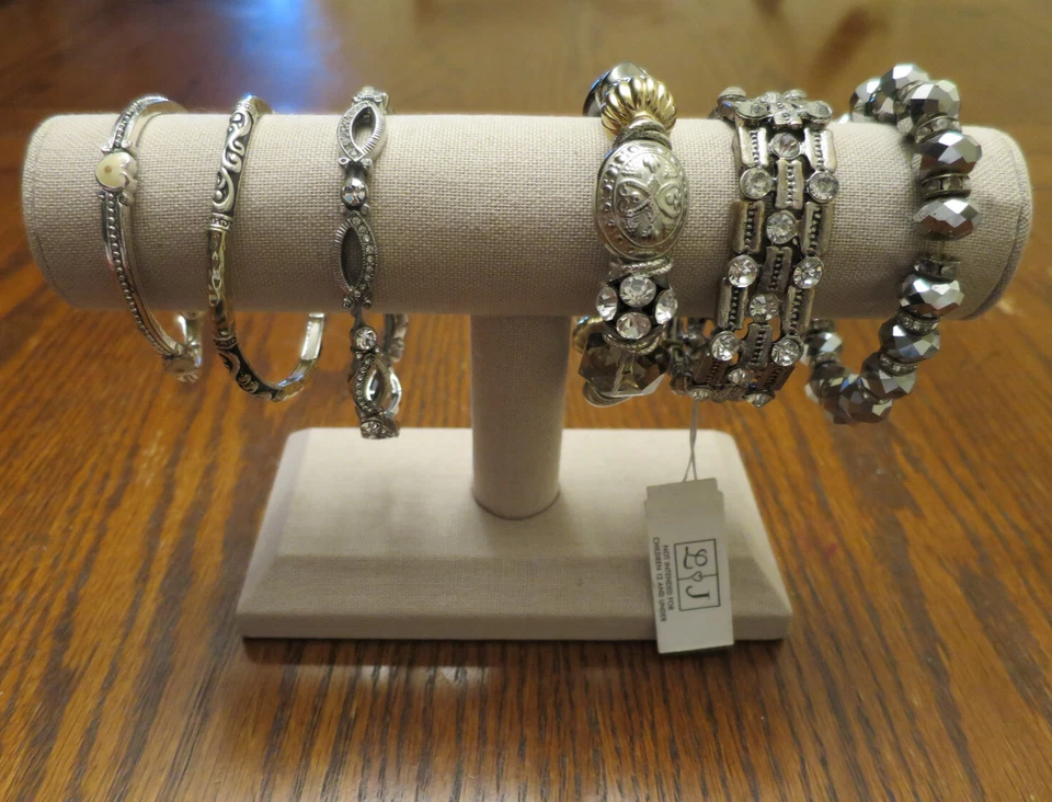 Lote de 6 pulseras elásticas tono plata - L&J, Monet, semilla de mostaza, pedrería leer Foto 2 de 4