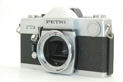 [AS-IS/The slow shutter won't move.] Petri FT II 35mm SLR Film Camera Body Only.