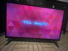 Black 32 Roku smart tv with remote