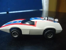 Aurora AFX Turbo Turn On White/Red/Blue Stars Non Mag Chassis runs