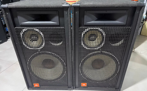 A pair of JBL SR4738A Speakers